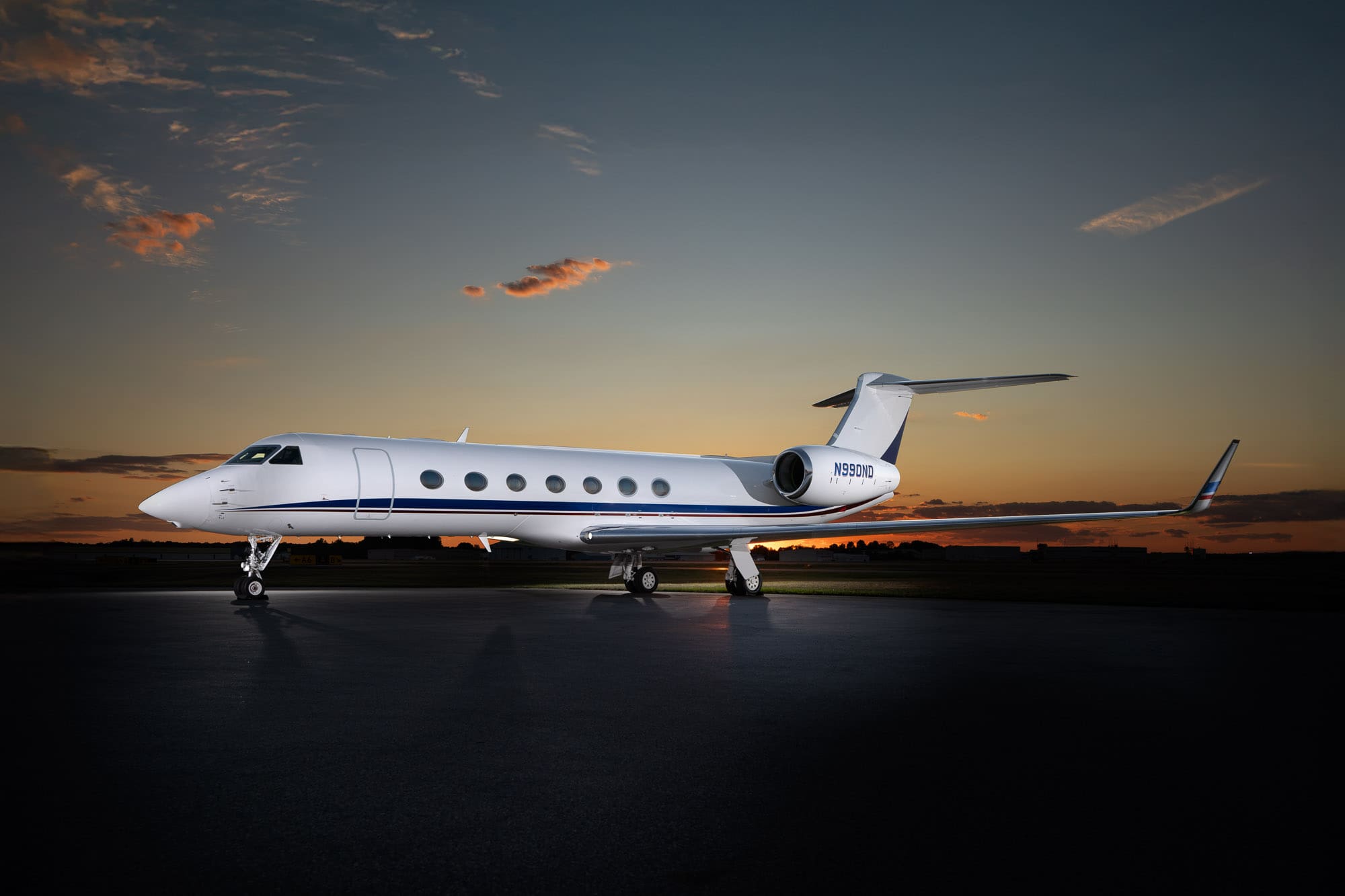 Gulfstream G550 silhouette at dawn — B&E Aviation Groups, here to get you there